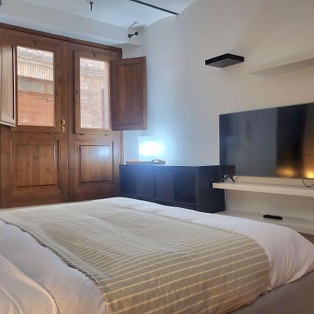 Appartamento Davanti Al Porto Romano 贝瓦尼亚 外观 照片